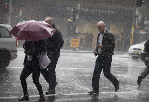 There has been no repreive from the rain for Sydney siders today in the CBD. Picture: AAP