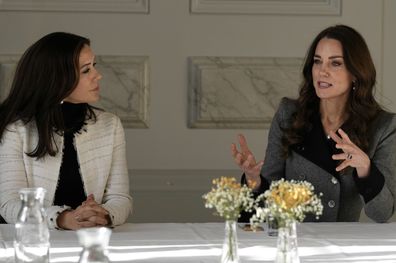 Kate, Duchess of Cambridge, right, and Denmark's Crown Princess Mary speak during a meeting with personnel as they visit the Danner Crisis Centre on February 23, 2022 in Copenhagen, Denmark
