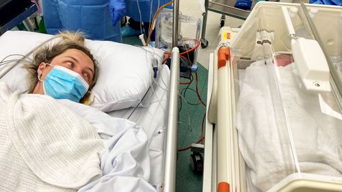 Michaela Jones, pictured in hospital with her daughter, Thea.