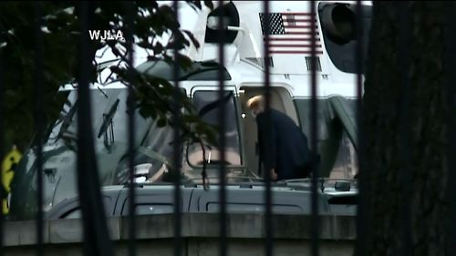 After giving reporters a thumbs up, Mr Trump boarded Marine One.