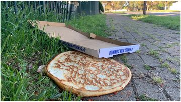 A man has been charged after allegedly using his own phone to call a pizza delivery man and rob him in Adselaide's north.