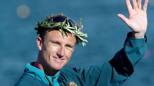 An August 28, 2004 file photo of Australian Nathan Baggaley celebrating after receiving a silver medal in the K1 500 mens event at the 2004 Olympic Games in Athens. (AAP)
