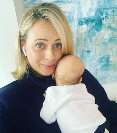 Sylvia Jeffreys holding her son Oscar.