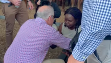 A lady has dropped to her knee&#x27;s following Prime Minister Scott Morrison&#x27;s press conference in Rockhampton this morning, begging for help for her family in Africa. 