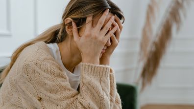 Stock photo of abused woman domestic violence victim.