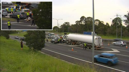 A man died after being struck by a truck on the Brisbane motorway. (9NEWS)