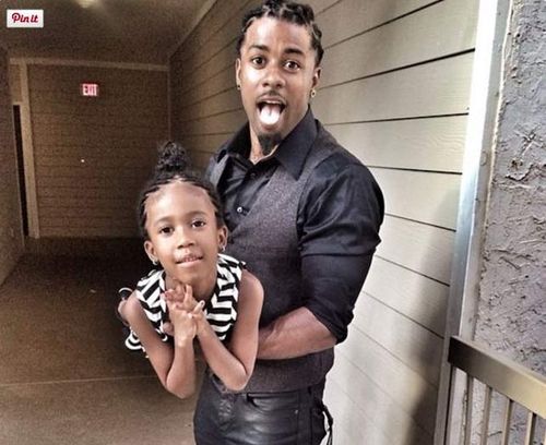 Popular fitness trainer Travis 'Achilles' Williams and his daughter. (Instagram)