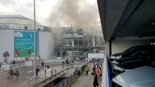 Smoke billows from Zaventem Airport in Brussels. (Supplied)