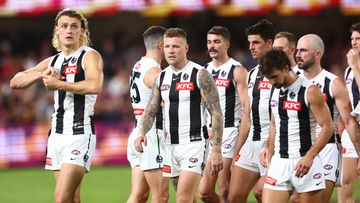 BRISBANE, AUSTRALIA - APRIL 06: Magpies leave the field after losing the round four AFL match between Brisbane Lions and Collingwood Magpies at The Gabba, on April 06, 2023, in Brisbane, Australia. (Photo by Chris Hyde/AFL Photos/via Getty Images )