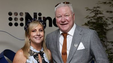 MELBOURNE, AUSTRALIA - NOVEMBER 05: Ann Cam and Scott Cam pose for a photo during 2024 Melbourne Cup Day at Flemington Racecourse on November 05, 2024 in Melbourne, Australia. (Photo by Sam Tabone/Getty Images)