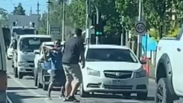 Two motorists were filmed blocking traffic at the intersections of Burke and Canterbury Roads in Camberwell.