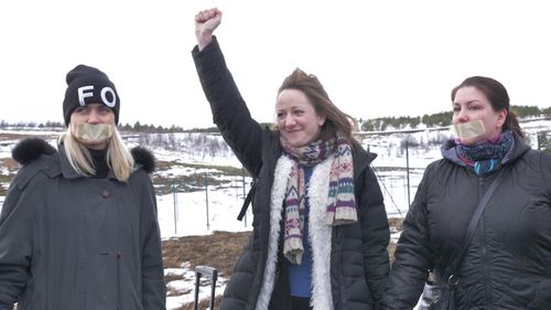 Nara Walker was supported by protesters as she entered the prison near Reykjavik.