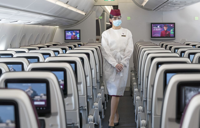 Qatar Airways coronavirus measures: cabin crew wear protective gowns, masks, glasses and gloves