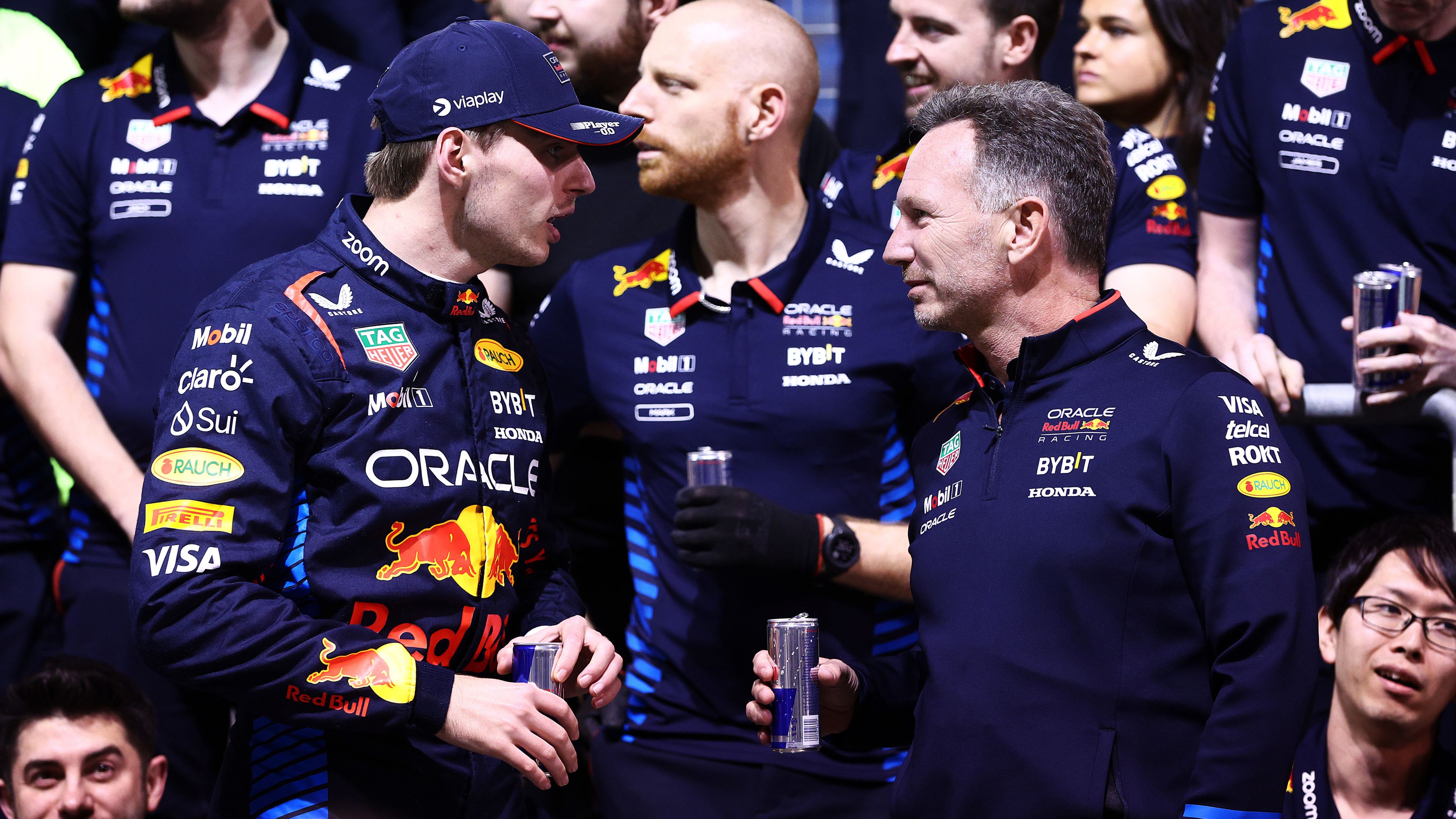 Race winner Max Verstappen of Red Bull Racing talks with team principal Christian Horner as they celebrate after the Bahrain Grand Prix. 