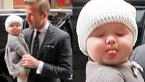 Seven-month-old Harper Beckham already loves the cameras