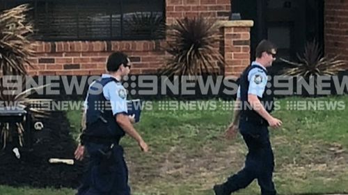 A crime scene was set up at the home after the girl's death. (9NEWS)