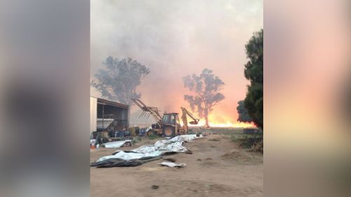 Fires are threatening homes in Victoria's north-east. (Picture: Alexis Daish, 9NEWS)
