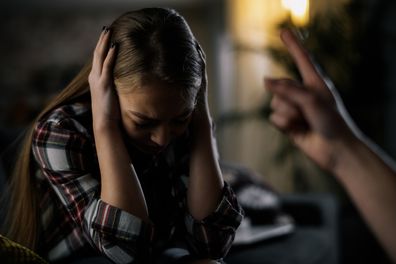 Mother slapping her daughter. Child bullying. Violence