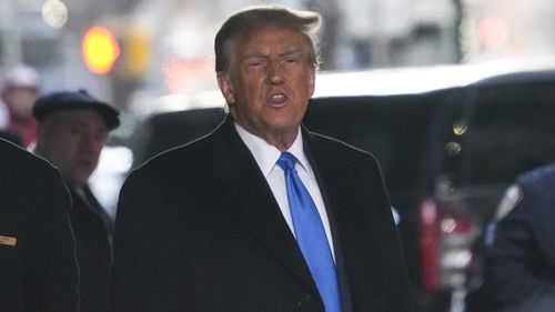 Former President Donald Trump leaves his apartment building in New York