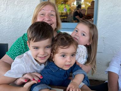 Danica Koevska with her three grandkids. 