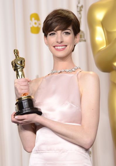 Anne Hathaway poses in the press room during the Oscars held at Loews Hollywood Hotel on February 24, 2013 in Hollywood, California.