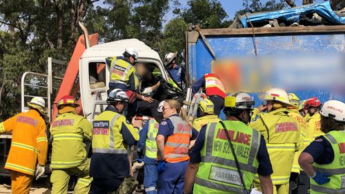 Dozens of emergency service workers combined to free the man from the wreck.
