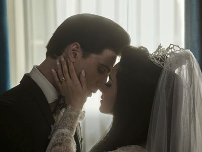 This image released by A24 shows Jacob Elordi as Elvis, left, and Cailee Spaeny as Priscilla, in a scene from "Priscilla."