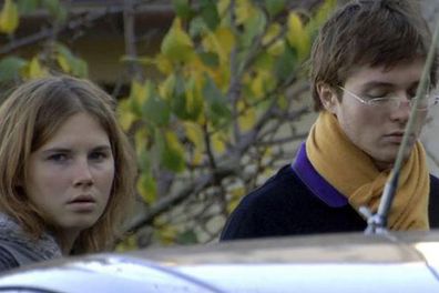 Amanda Knox with Raffaele Sollecito pictured outside the rented house where Meredith Kercher was found dead in Perugia, Italy. (AP)