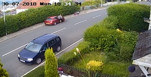 In the footage the driver is seen returning to his car and driving off after checking on the child.