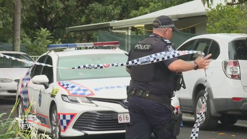 A woman has been charged with murder after a man was found dead in a unit in Cairns.
