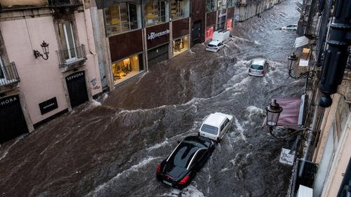 The Via Etnea turned into a river due to heavy rainfall in Catania, Italy. 