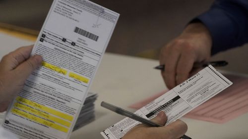 Workers count Milwaukee County ballots on Election Day at Central Count in Milwaukee (Photo: November 3, 2020)