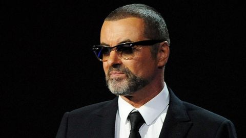 George Michael presents at the BRIT Awards 2012.