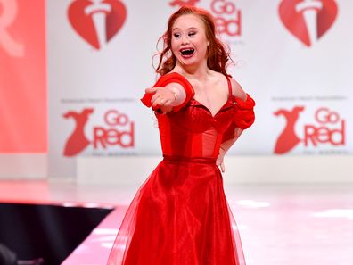 Madeline Stuart walks the runway at The American Heart Association's Go Red for Women Red Dress Collection 2020 