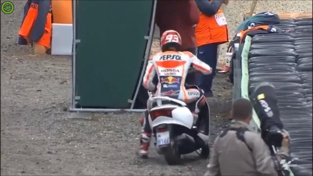 Marquez speeds through pit lane on scooter