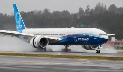 A Boeing 777X lands at Boeing Field in Seattle, after its first flight on Saturday, Jan. 25, 2020. According to Boeing, the 777X features large carbon-composite wings, the largest Boeing has ever designed