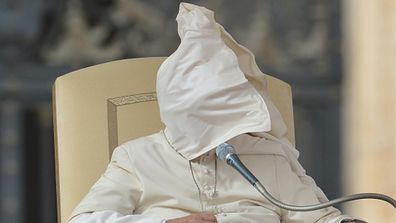 A windy Wednesday at the Vatican proved a challenge for Pope Francis. (Getty)