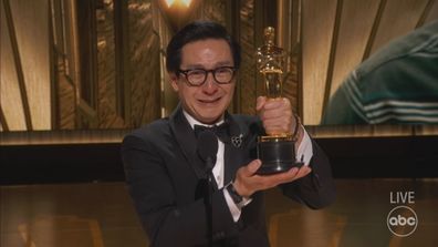 Ke Huy Quan with his Best Supporting Actor Oscar at the 2023 awards.
