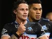 Sharks slump deepens as Titans hold on