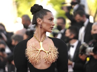 Bella Hadid poses for photographers upon arrival at the premiere of the film 'Three Floors' at the 74th international film festival, Cannes, southern France, Sunday, July 11, 2021. 