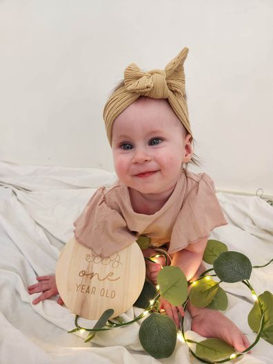 Now one, Violet is a cheerful, cheeky baby and does six days of therapies a week.