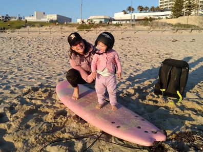 Candice from Surfing Mums Australia on the beach. 
