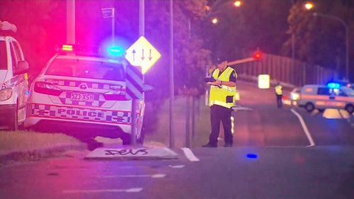 The police officer was injured when he was struck by a car speeding in Tarragindi, south of Brisbane. (9NEWS)