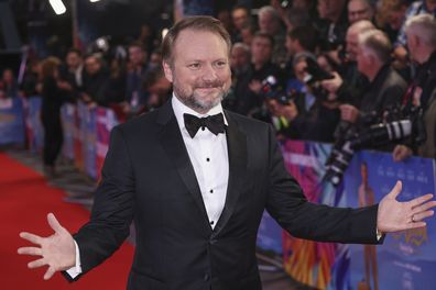 Director Rian Johnson poses for photographers upon arrival for the premiere of the film 'Glass Onion: A Knives Out Mystery' and the closing evening of the 2022 London Film Festival in London, Sunday, Oct. 16, 2022. 