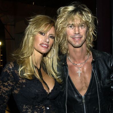 Susan Holmes and Duff McKagan during 2004 BMG GRAMMY After Party - Inside at The Avalon in Hollywood, California, United States.