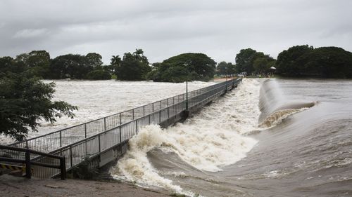 Floodwaters are seen at Aplins Weir in Townsville.