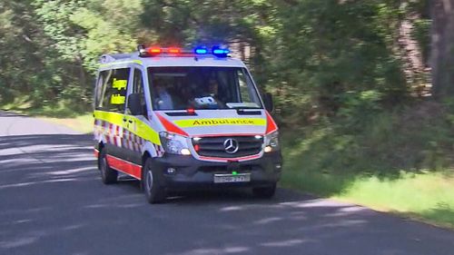 An ambulance rushes to the premises in Coledale, a small seaside village 18 kilometres north of Wollongong.