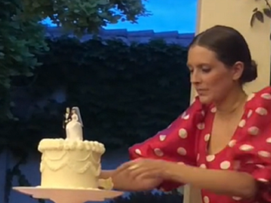 wedding cake eaten by guest before formal slicing