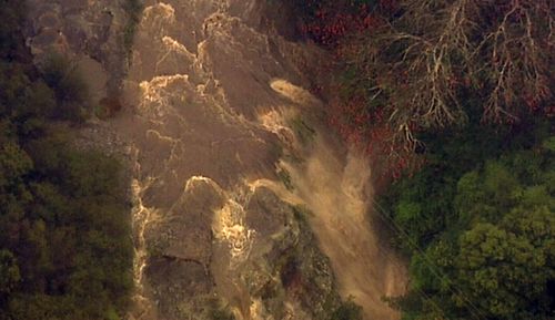 Oxford Falls on the northern beaches had such a deluge a 'waterfall' of rainwater formed.

