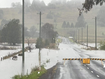 A weather system moving down the coast from Queensland has brought unseasonably heavy rain to flood-prone parts of northern NSW